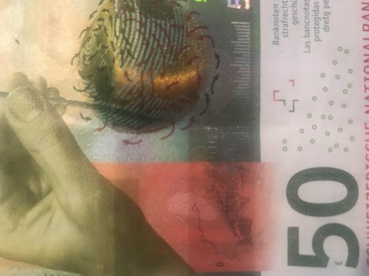 Grossaufnahme einer 50er Banknote.